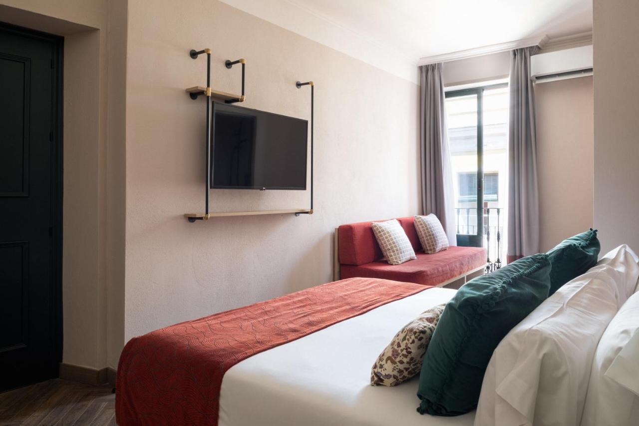 The Honest Hotel & Apartments Sevilla Bagian luar foto